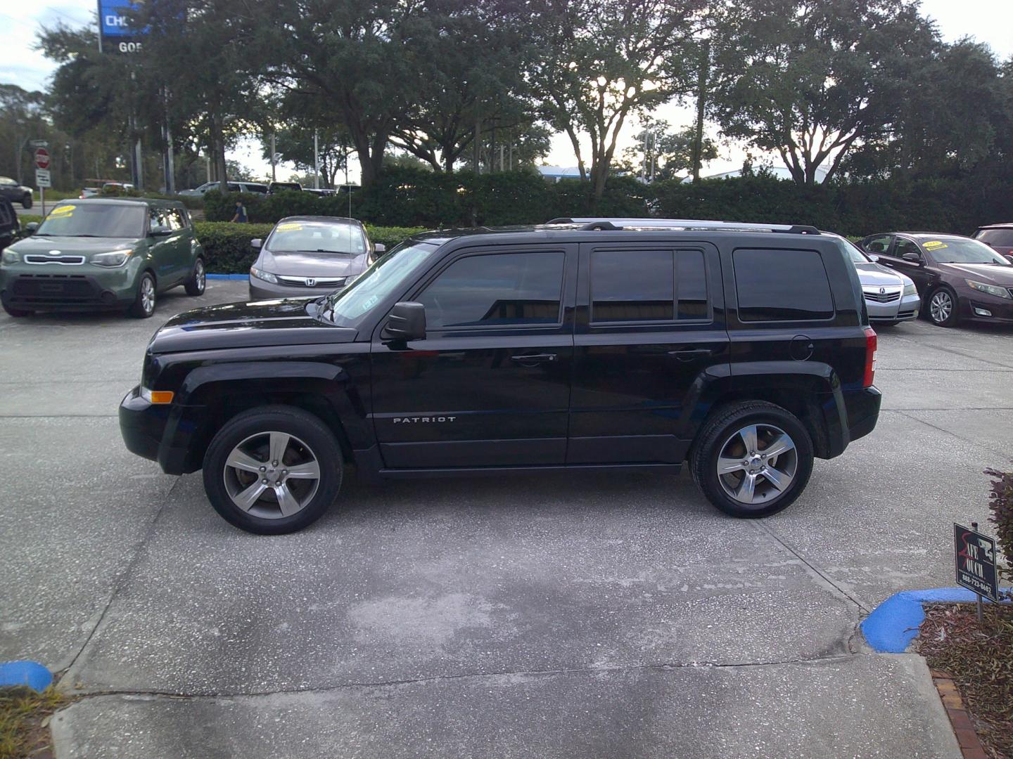 2016 BLACK JEEP PATRIOT LATITUDE (1C4NJPFA0GD) , located at 10405 Abercorn Street, Savannah, GA, 31419, (912) 921-8965, 31.988262, -81.131760 - Photo#1